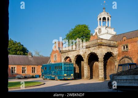 blue horsebox trailer truck parked outside ingestre hall stables in stafford staffordshire Stock Photo