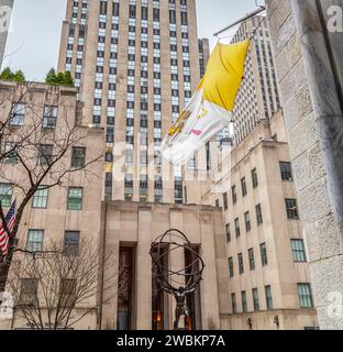 NEW YORK, USA - MARCH 6, 2020: Atlas, a bronze statue in Rockefeller Center, Midtown Manhattan. It is across on Fifth Avenue in St. Patrick's Cathedra Stock Photo