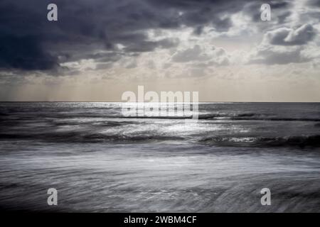 Rough sea, on a winter morning of sun, wind and silence Stock Photo