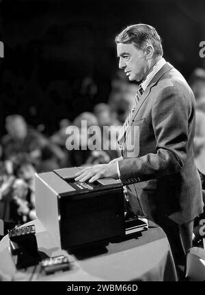 Edwin Land. Portrait of the American inventor of the Polaroid Camera, Edwin Herbert Land (1909-1991), presenting the Polavision home movie system, 1977 Stock Photo