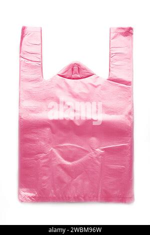 Pink plastic bags isolated on white background. Top view. Stock Photo