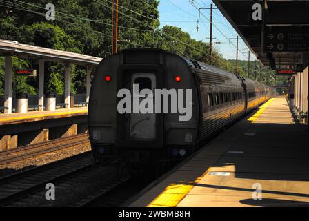 A photo of an Amtrak Northeast Regional train at the BWI train station. Stock Photo