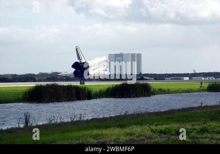 KENNEDY SPACE CENTER, FLA. -- Orbiter Endeavour appears to head toward the Vehicle Assembly Building (background) as it approaches touchdown on Runway 15 at the KSC Shuttle Landing Facility, completing mission STS-108. After a mission-elapsed time of 11 days, 19 hours and 35 minutes, the landing is the 57th at KSC in the history of the program. Main gear touchdown occurred at 12 55 10 p.m. EST (17 55 10 GMT), nose gear touchdown at 12 55 23 p.m. (17 55 23 GMT) , wheel stop at 12 56 13 p.m. (17 56 13 GMT). STS-108 was the 12th mission to the International Space Station. This mission was the 107 Stock Photo