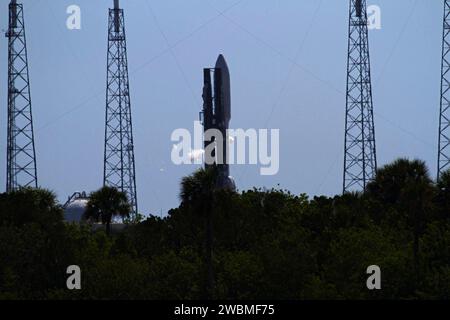 CAPE CANAVERAL, Fla. -- NASA's Juno planetary probe, enclosed in its payload fairing, is moments away from beginning its five-year journey to Jupiter atop a United Launch Alliance Atlas V-551 launch vehicle from Space Launch Complex 41 on Cape Canaveral Air Force Station in Florida.  Liftoff was at 12:25 p.m. EDT Aug. 5. The solar-powered spacecraft will orbit Jupiter's poles 33 times to find out more about the gas giant's origins, structure, atmosphere and magnetosphere and investigate the existence of a solid planetary core. NASA's Jet Propulsion Laboratory, Pasadena, Calif., manages the Jun Stock Photo