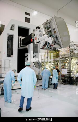 Lockheed Martin Solar Array Lab Technicians at Kennedy Space Center positioned Mars Reconnaissance ...