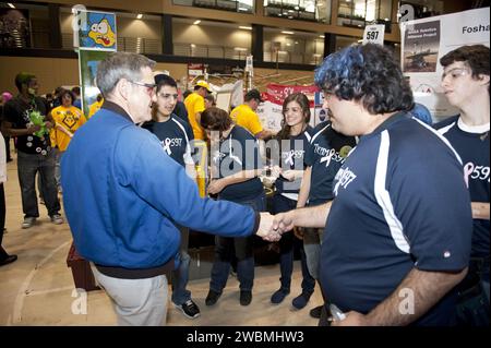 At the regional FIRST robotics competition in Orlando, NASA Kennedy Space Center Director Bob Cabana spoke to The Wolverines team from Foshay Learning Center. The team won the Industrial Safety Award among 60 high school teams. Stock Photo