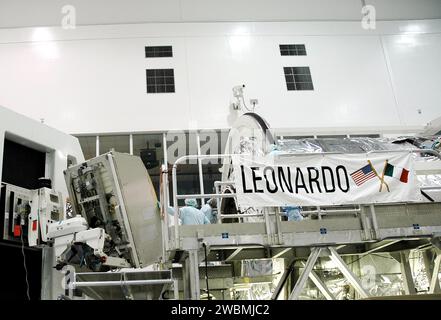 KENNEDY SPACE CENTER, FLA. - In the Space Station Processing Facility, technicians prepare to install the the Minus Eighty Degree Laboratory Freezer for ISS (MELFI) science rack into the Multi-Purpose Logisitics Module Leonardo. Leonardo will fly on Space Shuttle Atlantis on mission STS-121. The MELFI will provide cooling and storage for scientific experiment samples and perishable materials in four insulated containers, known as dewars, with independently selectable temperatures of -80 degrees Celsius, -26 degrees Celsius, and +4 degrees Celsius. MELFI will also be used to transport samples t Stock Photo