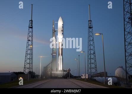 CAPE CANAVERAL, Fla. -- As night descends on Space Launch Complex 41 at Cape Canaveral Air Force Station in Florida, the United Launch Alliance Atlas V-551 launch vehicle is being readied for launch.  Atop the rocket is NASA's Juno planetary probe, enclosed in its payload fairing.  Liftoff is planned during a launch window which extends from 11:34 a.m. to 12:43 p.m. EDT on Aug. 5. The solar-powered spacecraft will orbit Jupiter's poles 33 times to find out more about the gas giant's origins, structure, atmosphere and magnetosphere and investigate the existence of a solid planetary core. NASA's Stock Photo