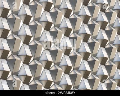 Facade detail out of abstract shapes. The honeycomb structure out of aluminium metal is mounted to a building wall. Cubism architecture design . Stock Photo