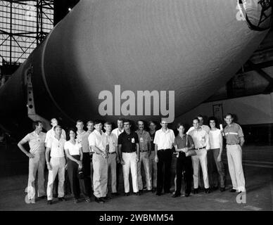 KENNEDY SPACE CENTER, FLA. -- Seventeen new astronaut candidates visited the Vehicle Assembly Building as part of an orientation tour of KSC facilities. Here they are grouped around one of the external fuel tanks in the transfer aisle of the VAB. This latest group of candidates is the tenth chosen since the original seven Mercury astronauts. [From left, Michael J. McCulley, Curtis L. Brown Jr., Frank L. Culbertson Jr., Kathryn C. Thornton, Mark N. Brown, Mark C. Lee, Kenneth D. Cameron, John H. Casper, L. Blaine Hammond Jr., Charles Lacy Veach (deceased), James C. Adamson, William M. Shepherd, Stock Photo