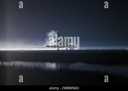 With its drag chute deployed Space Shuttle Discovery slows to a stop ...
