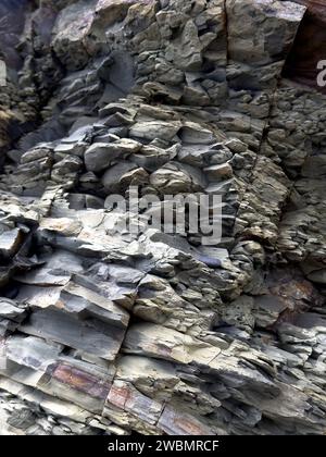 Natural, abstract rock formations with cracks, layers and textures. Stock Photo
