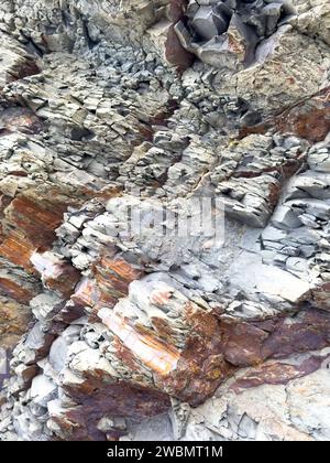 Natural, abstract rock formations with cracks, layers and textures. Stock Photo