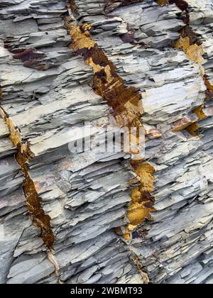 Natural, abstract rock formations with cracks, layers and textures. Stock Photo