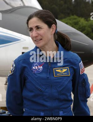 CAPE CANAVERAL, Fla. – Space shuttle Discovery's STS-128 mission crew members arrive in T-38 training jets at NASA Kennedy Space Center's Shuttle Landing Facility.   Mission Specialist Nicole Stott is seen here. Stott will join the Expedition 20 crew on the International Space Station as a flight engineer.  The astronauts will be taking part in terminal countdown demonstration test activities that include equipment familiarization and emergency egress training, and will culminate in a simulated launch countdown aboard Discovery.  The mission will deliver 33,000 pounds of equipment to the Inter Stock Photo