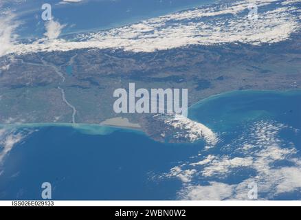 ISS026-E-029133 (24 Feb. 2011) --- From approximately 220 miles above Earth, an Expedition 26 crew member aboard the International Space Station exposed this oblique-angle still frame of parts of New Zealand including those impacted by an earthquake almost four days ago.  This image provides a view across the South Island of New Zealand.  One can see the Southern Alps mountain range, along the length of the island (more on the west side) which is formed where the Indo-Australian and Pacific tectonic plates meet.  Death toll announced on Feb. 24, the day this picture was taken, had reached slig Stock Photo