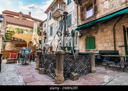 Ancient water well in the Old town of Kotor, Montenegro Stock Photo