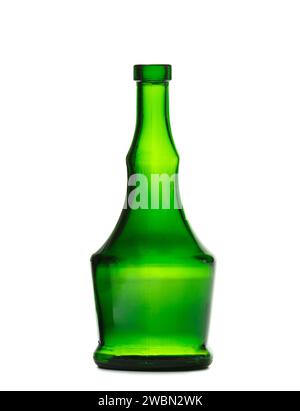An empty bottle for alcoholic beverages made of dark green glass of a beautiful unusual shape, isolated on a white background. Bottle for cognac Stock Photo