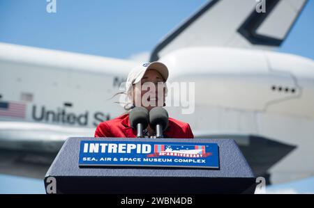 NASA Deputy Administrator Lori Garver speaks Friday, April 27, 2012, during the transfer ceremony for space shuttle Enterprise at John F. Kennedy Airport in New York. Enterprise was the first shuttle orbiter built for NASA performing test flights in the atmosphere and was incapable of spaceflight. Originally housed at the Smithsonian's Steven F. Udvar-Hazy Center, Enterprise will be demated from the SCA and placed on a barge that will eventually be moved by tugboat up the Hudson River to the Intrepid Sea, Air & Space Museum in June. Stock Photo
