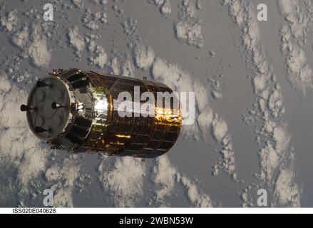 ISS020-E-040628 (17 Sept. 2009) --- Backdropped by a scattering of clouds over part of Earth, the unpiloted Japanese H-II Transfer Vehicle (HTV) approaches the International Space Station. Once the HTV was in range, NASA astronaut Nicole Stott, Canadian Space Agency astronaut Robert Thirsk and European Space Agency astronaut Frank De Winne, all Expedition 20 flight engineers, used the station’s robotic arm to grab the cargo craft and attach it to the Earth-facing port of the Harmony node. The attachment was completed at 5:26 (CDT) on Sept. 17, 2009. Stock Photo