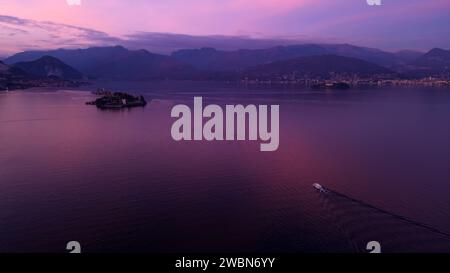 Beautiful sunset on Lake Maggiore. Aerial view of the island, Isola Bella, Isola Superiore. New Year holidays on the Italian island Stock Photo