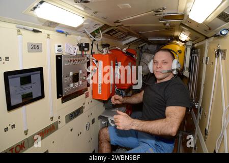 iss063e101224 (Sept. 9, 2020) --- Roscosmos cosmonaut and Expedition 63 Flight Engineer Ivan Vagner works on orbital hardware inside the Russian segment of the International Space Station. Stock Photo