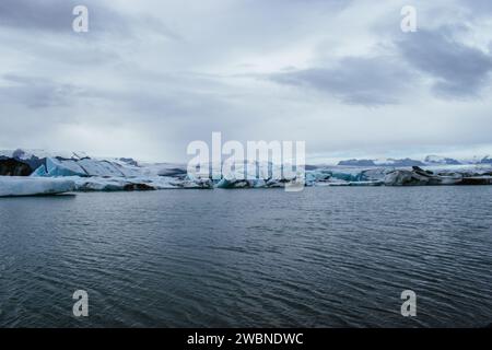 Title: Scenic view of frozen lake against sky - Glacial Lagoon Stock Photo