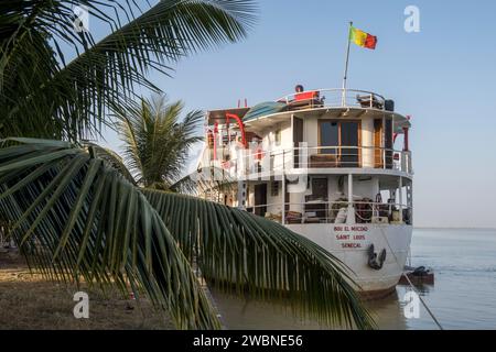 West Africa, Senegal, Saint Louis. Bou el Mogdad tourist ship (for trips up River Senegal) on the quay. Stock Photo