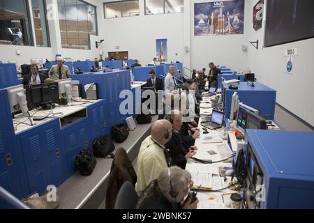 NASA and contractor engineers monitor the countdown for the launch of the Tracking and Data Relay Satellite (TDRS-L) atop a United Launch Alliance Atlas V rocket at Cape Canaveral. TDRS-L is the second of three satellites expanding the TDRSS fleet, providing tracking, telemetry, command, and high-bandwidth data return for science and human exploration missions, including the Hubble Space Telescope and International Space Station. Stock Photo