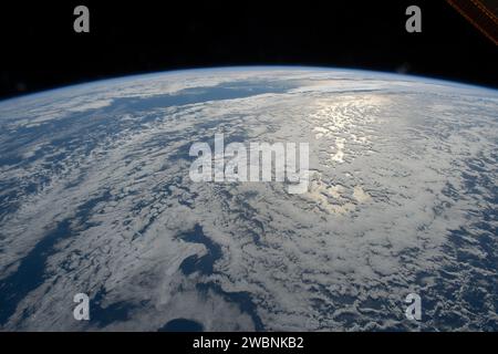 Sunlight reflects off the South Pacific Ocean as the ISS orbited near Auckland, New Zealand on July 14, 2020. Stock Photo