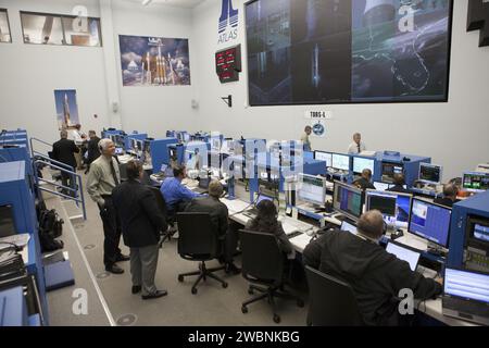 NASA and contractor engineers monitor the countdown for the Atlas V launch of TDRS-L at Cape Canaveral's Spaceflight Operations Center. TDRS-L is the second of three new satellites in the TDRSS fleet providing tracking, telemetry, command, and high-bandwidth data services for science and human missions in Earth orbit. Stock Photo