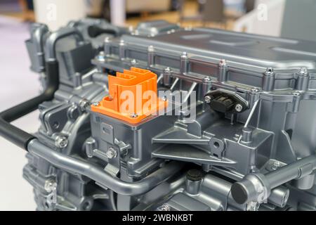 Powerful engine motor beneath the hood of an electric vehicle (EV). This glimpse captures the advanced technology driving the eco-friendly revolution, Stock Photo