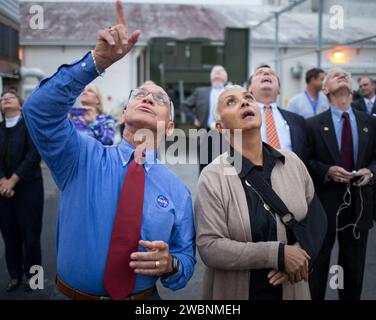 NASA Administrator Charles Bolden and his wife Jackie Bolden watch as the United Launch Alliance Delta IV Heavy rocket, with NASA’s Orion spacecraft mounted atop, lifts off on Exploration Flight Test-1 (EFT-1) from Cape Canaveral Air Force Station's Space Launch Complex 37 at at 7:05 a.m. EST, Friday, Dec. 5, 2014, Cape Canaveral, Florida. Part of Batch image transfer from Flickr. Stock Photo