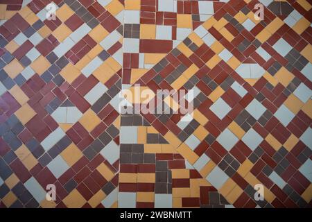 Colorful mosaic tiles floor. Interesting shapes triangles mosaics. Background texture mosaic Stock Photo