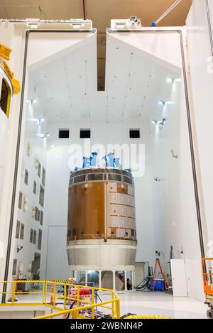 Engineers and technicians moved the Orion service module test article into the Reverberant Acoustic Test Facility at NASA Glenn Research Center’s Plum Brook Station in Sandusky, Ohio on April 8, 2016. Acoustic testing is scheduled to begin April 18. The blue structure sitting on top of the test article is a mass simulator that represents the Orion crew module...The test article will be blasted with at least 152 decibels and 20-10,000 hertz of sound pressure and vibration to simulate the intense sounds the Orion service module will be subjected to during launch and ascent into space atop the ag Stock Photo