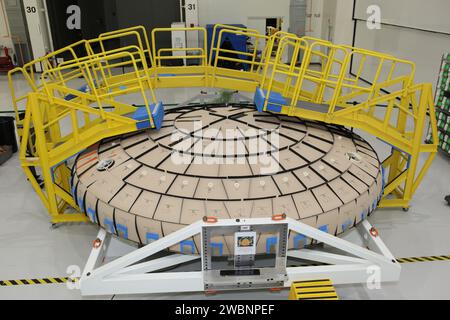 Tile blocks are prefitted around the heat shield for the Orion crew module inside the Neil Armstrong Operations and Checkout Building high bay at NASA’s Kennedy Space Center in Florida on Oct. 24, 2016. Part of Batch images transfer from Flickr. Stock Photo