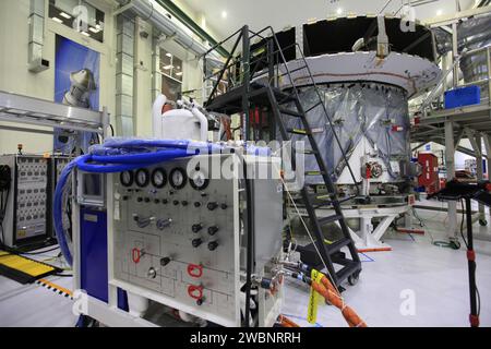 The Artemis I crew and service module are being prepared for mating ...