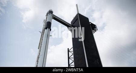 A SpaceX Falcon 9 rocket with the company's Crew Dragon spacecraft onboard is seen on the launch pad at Launch Complex 39A as preparations continue for the Demo-2 mission, Thursday, May 28, 2020, at NASA’s Kennedy Space Center in Florida. NASA’s SpaceX Demo-2 mission is the first launch with astronauts of the SpaceX Crew Dragon spacecraft and Falcon 9 rocket to the International Space Station as part of the agency’s Commercial Crew Program. The test flight serves as an end-to-end demonstration of SpaceX’s crew transportation system. Robert Behnken and Douglas Hurley are scheduled to launch at Stock Photo