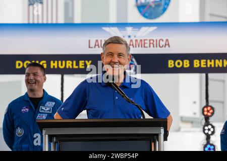 Kennedy Space Center Director Bob Cabana speaks to members of the media during a press briefing May 29, 2020, near the Press Site countdown clock at Kennedy ahead of NASA’s SpaceX Demo-2 launch. Behind him is NASA astronaut Kjell Lindgren. The launch, initially scheduled for May 27, was scrubbed due to unfavorable weather conditions. The next launch attempt is Saturday, May 30. A SpaceX Falcon 9 rocket and Crew Dragon spacecraft are scheduled to lift off from historic Launch Complex 39A, carrying NASA astronauts Robert Behnken and Douglas Hurley to the International Space Station. This will ma Stock Photo