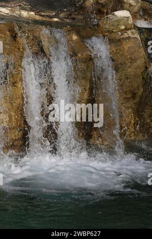 A beautiful large waterfall photographed in close-up against the ...