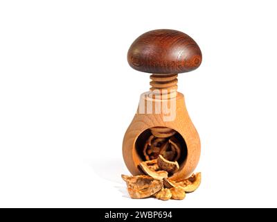 Walnut and nutcracker in a close-up Stock Photo
