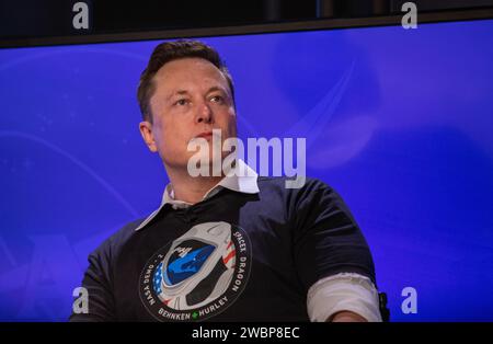 Chief Engineer of SpaceX Elon Musk participates in a postlaunch news conference inside the Press Site auditorium at NASA’s Kennedy Space Center in Florida on May 30, 2020, following the launch of the agency’s SpaceX Demo-2 mission to the International Space Station. Liftoff of the SpaceX Falcon 9 rocket and Crew Dragon spacecraft, carrying NASA astronauts Robert Behnken and Douglas Hurley, occurred at 3:22 p.m. EDT from historic Launch Complex 39A. Behnken and Hurley are the first astronauts to launch to the space station from U.S. soil since the end of the Space Shuttle Program in 2011. Part Stock Photo