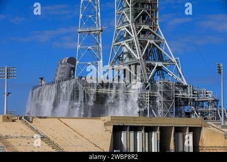 NASA’s Exploration Ground Systems conducts a water flow test with the mobile launcher at Kennedy Space Center’s Launch Complex 39B in Florida on Oct. 24, 2023. It is the third in a series of tests to verify the overpressure protection and sound suppression system is ready for launch of the Artemis II mission. During liftoff, 400,000 gallons of water will rush onto the pad to help protect NASA’s SLS (Space Launch System) rocket, Orion spacecraft, mobile launcher, and launch pad from any over pressurization and extreme sound produced during ignition and liftoff. Stock Photo