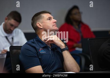 Artemis II crew member CSA (Canadian Space Agency) astronaut Jeremy Hansen participates in a pre-task briefing on Tuesday, Sept. 19, 2023, held in the Rocco A. Petrone Launch Control Center at NASA’s Kennedy Space Center in Florida. The briefing allows teams to collaborate ahead of a series of integrated system verification and validation tests conducted at Kennedy to evaluate the readiness of the crew and ground equipment ahead of launch day. Stock Photo