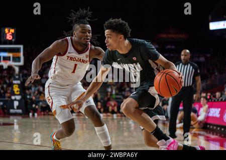 Washington State Cougars guard Isaiah Watts (12) is defended by USC Trojans guard Isaiah Collier (1) during a NCAA men’s basketball game, Wednesday, J Stock Photo