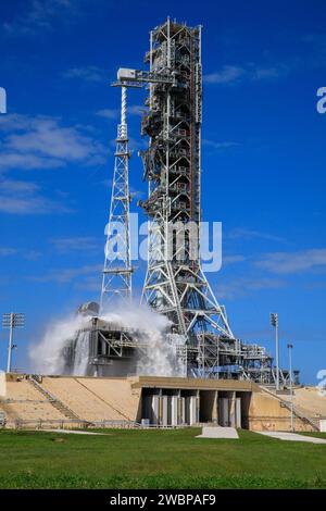 NASA’s Exploration Ground Systems conducts a water flow test with the mobile launcher at Kennedy Space Center’s Launch Complex 39B in Florida on Oct. 24, 2023. It is the third in a series of tests to verify the overpressure protection and sound suppression system is ready for launch of the Artemis II mission. During liftoff, 400,000 gallons of water will rush onto the pad to help protect NASA’s SLS (Space Launch System) rocket, Orion spacecraft, mobile launcher, and launch pad from any over pressurization and extreme sound produced during ignition and liftoff. Stock Photo