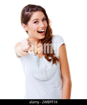 Laugh, bullying and woman pointing with smile in studio on white background for humor, shame and mocking. Body language, mean and portrait of girl Stock Photo