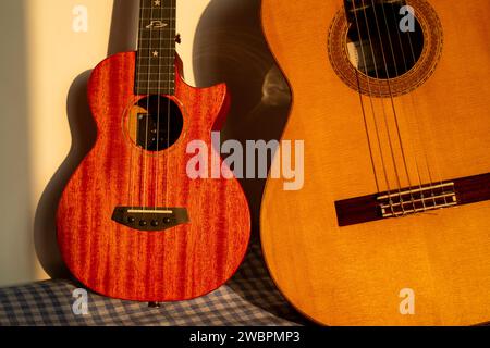 A guitar and a ukulele. Stock Photo