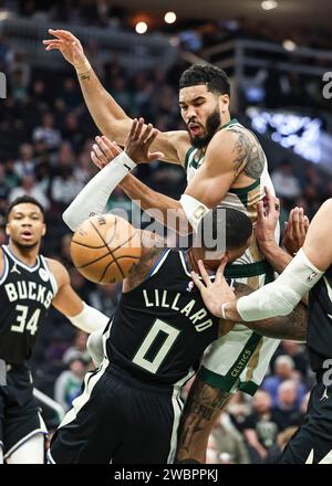 Boston Celtics forward Jayson Tatum, front right, meets with Los ...