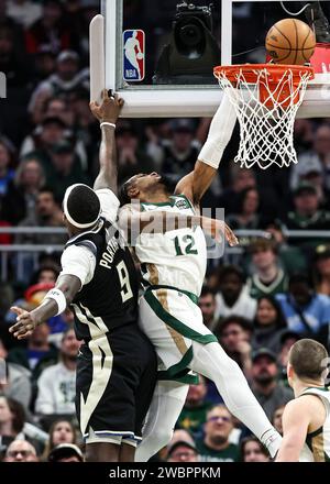 Milwaukee, USA. 11th Jan, 2024. Boston Celtics forward Oshae Brissett (R) dunks during the NBA regular season game between Milwaukee Bucks and Boston Celtics in Milwaukee, the United States, Jan. 11, 2024. Credit: Joel Lerner/Xinhua/Alamy Live News Stock Photo